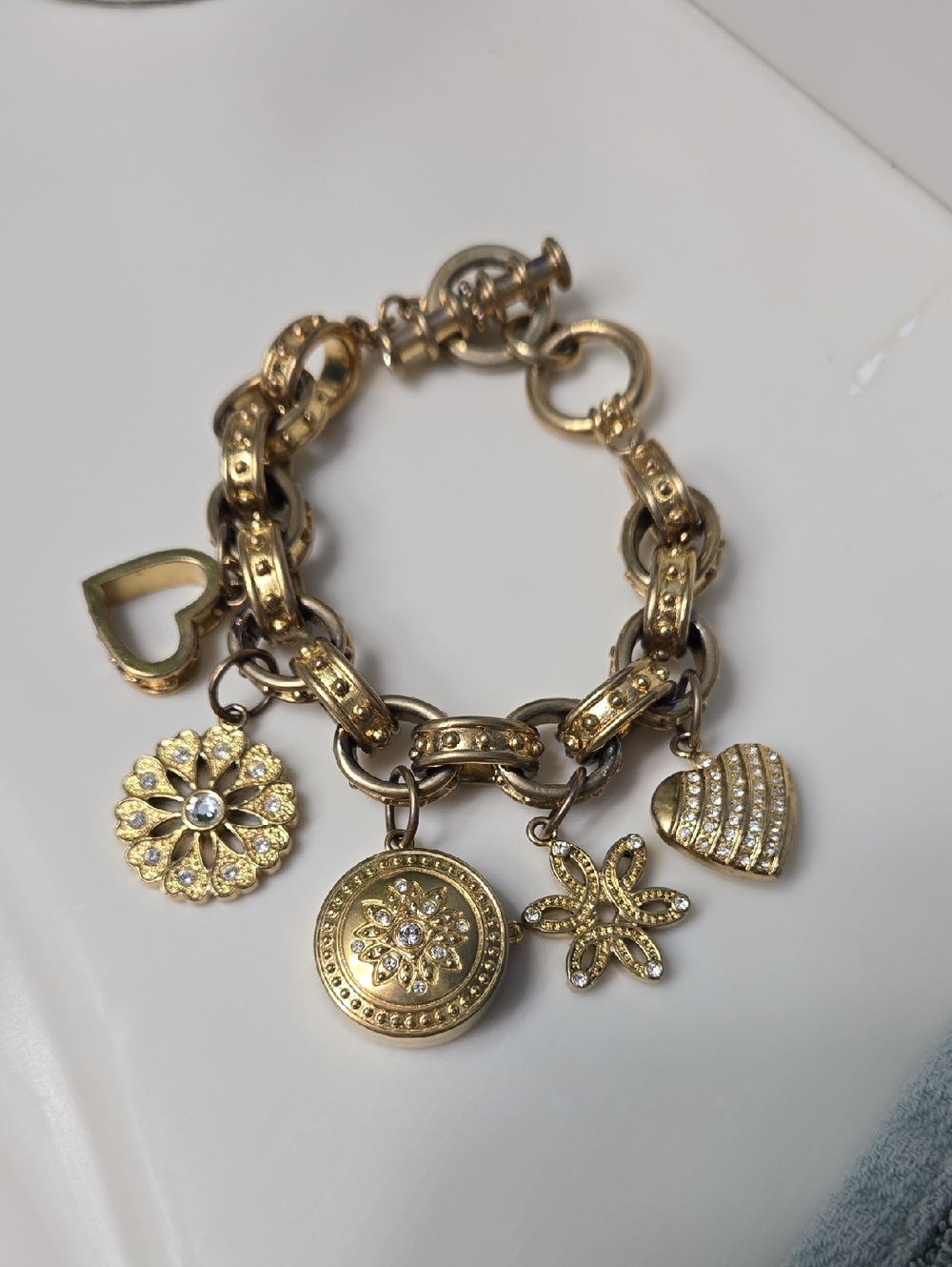 Anne Klein Vintage Gold Tone Charm Bracelet with Heart Watch & Floral Charms - Picture 15 of 15